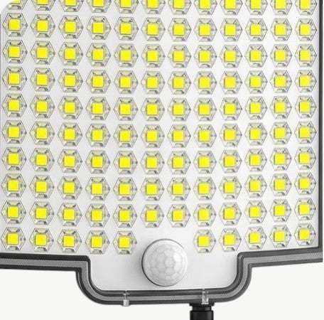 Rinef 106 LED solar outdoor light with motion sensor, weatherproof ABS plastic, ideal for gardens and driveways.