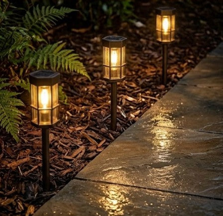 Rinef EcoGlow solar garden torch lights with automatic dusk activation, durable ABS material, warm illumination.